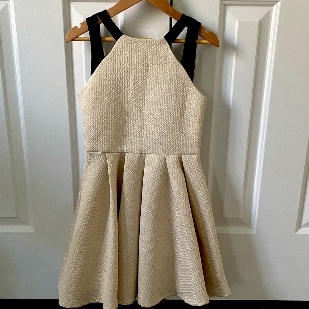 Sally Miller Couture Girls Dress Size S (7/8). Gold with black detail straps.